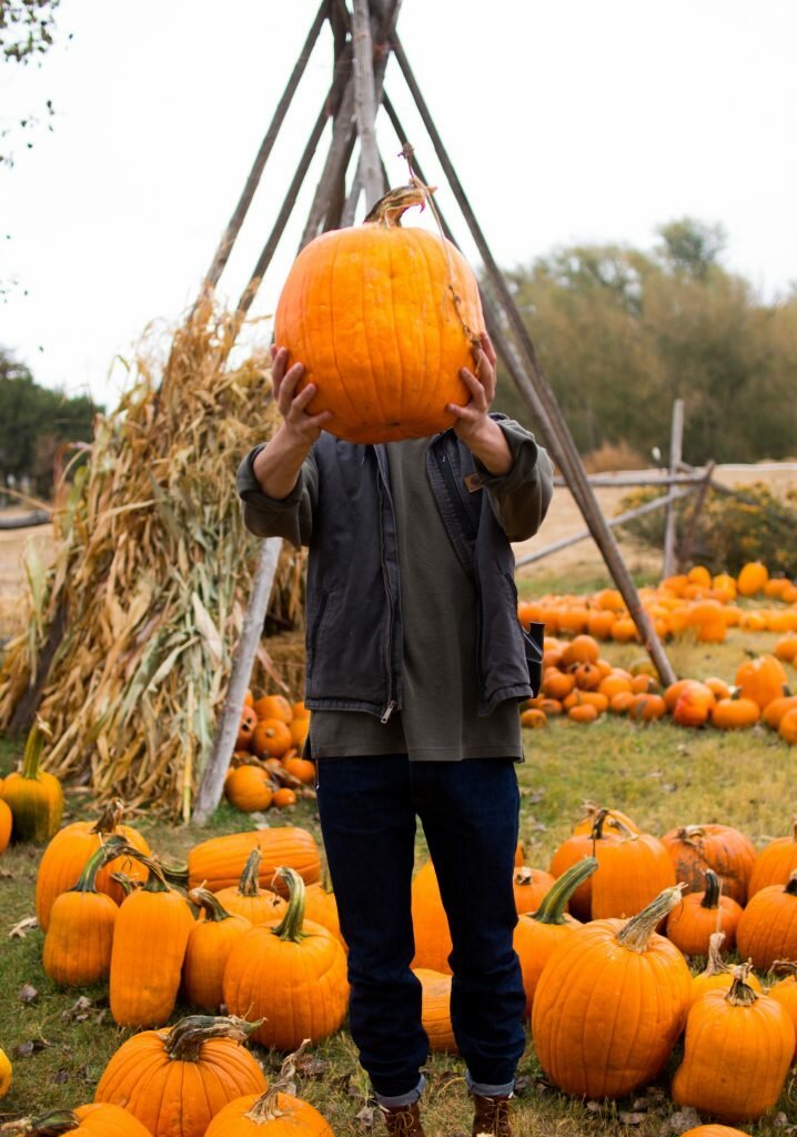 holding pumpkin